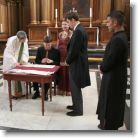 17.tony signs the registry * 750 x 750 * (120KB)